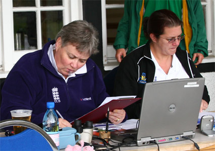 [Scorers Sue Robinson & Debbie Beesley balance the books]